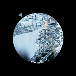 Broken glass over a blue background.
